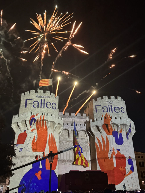 The old gate of Valencia with firework in the background