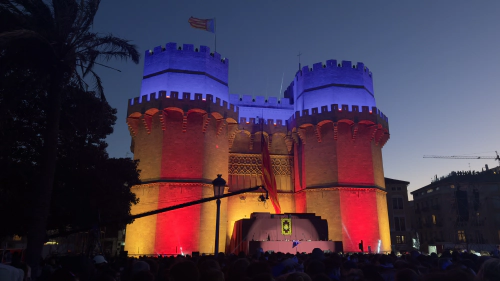 Gate of Valencia with the flag projected against it