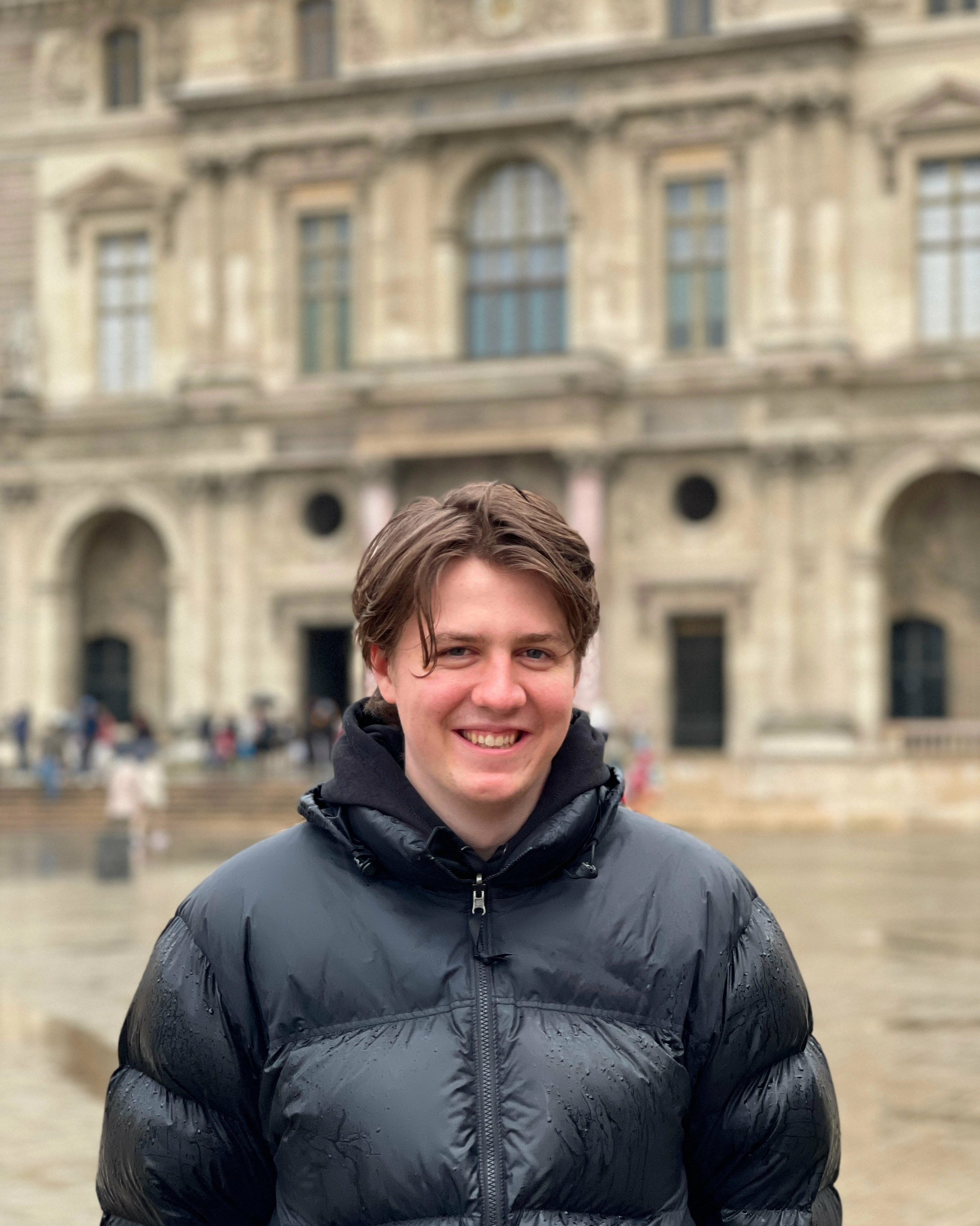 Me in Paris standing in front of the Élysée Palace.